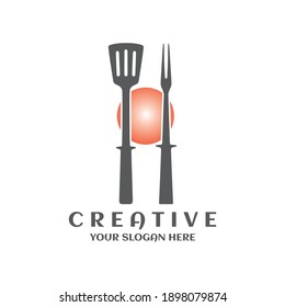 Spatula and barbecue fork icon. Grill tool for restaurant logo
