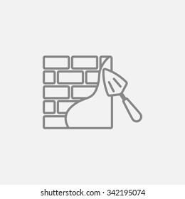 Espátula con un icono de la línea de ladrillo para web, móviles e infografías. Icono vector de gris oscuro aislado en fondo gris claro.