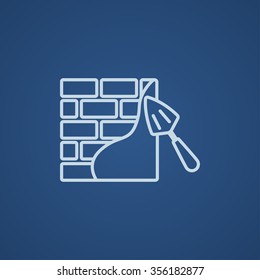 Spatula with brickwall line icon for web, mobile and infographics. Vector light blue icon isolated on blue background.