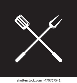 Spatula and fork monochrome vector illustration in black background