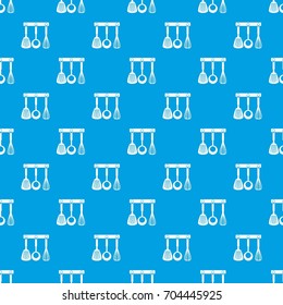 Spatula, ladle and whisk, kitchen tools on a hanger pattern repeat seamless in blue color for any design. Vector geometric illustration