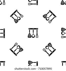 Spatula, ladle and whisk, kitchen tools on a hanger pattern repeat seamless in black color for any design. Vector geometric illustration