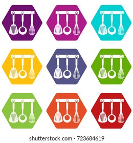 Spatula, ladle and whisk, kitchen tools on a hanger icon set many color hexahedron isolated on white vector illustration