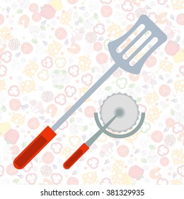 Spatula and roller for cutting pizza.