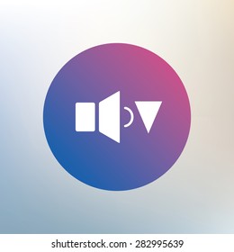 Speaker low volume sign icon. Sound symbol. Icon on blurred background. Vector