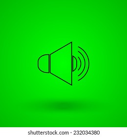 speaker on green background
