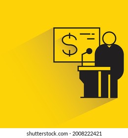 speaker on podium on yellow background