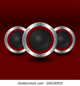 Speakers set with shadows over red background