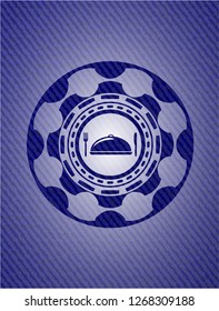 special food icon inside badge with denim background