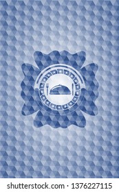 special food icon inside blue emblem or badge with geometric pattern background.