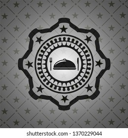 special food icon inside dark emblem