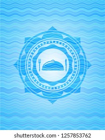 special food icon inside sky blue water badge.