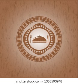 special food icon inside wood emblem