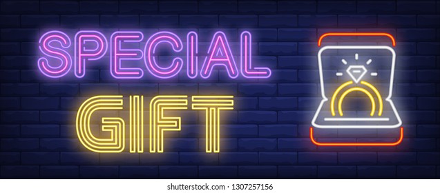 Special gift neon text and golden ring with gem in box. Jewelry design. Night bright neon sign, colorful billboard, light banner. Vector illustration in neon style.