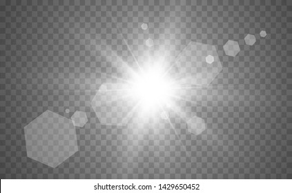 Special lens flash, light effect. The flash flashes rays and searchlight. White glowing light. Beautiful star Light from the rays. The sun is back-lit. Bright beautiful star. Sunlight. Glare.