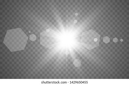 Special lens flash, light effect. The flash flashes rays and searchlight. White glowing light. Beautiful star Light from the rays. The sun is back-lit. Bright beautiful star. Sunlight. Glare.