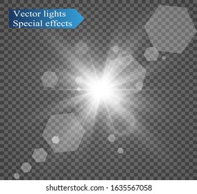 Special lens flash, light effect. The flash flashes rays and searchlight. White glowing light. Beautiful star Light from the rays. The sun is back-lit. Bright beautiful star. Sunlight. Glare.