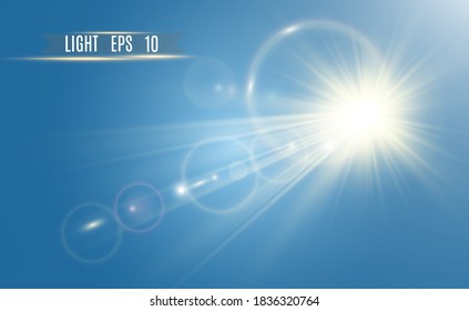 	
Special lens flash, light effect. The flash flashes rays and searchlight. White glowing light. Beautiful star Light from the rays. The sun is back-lit. Bright beautiful star. Sunlight. Glare.	
