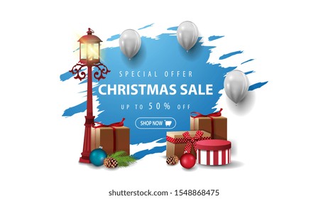 Special offer, Christmas sale, up to 50% off, banner with white balloons and pole lantern with presents. Blue torn banner isolated on white background.