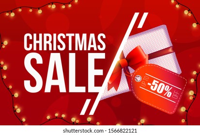 Special offer, Christmas sale, up to 50% off, red banner with garland, Christmas tree branches, Christmas stockings and gifts