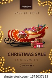 Special offer, Christmas sale, up to 50% off, vertical brown discount banner with frame of garland and Santa Sleigh with presents