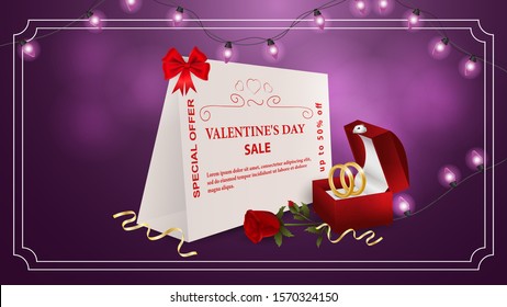 Special offer Valentines day discount up to fifty percent purple banner box with rings and rose flower with the inscription on the bum frame garland of light bulbs vector EPS 10