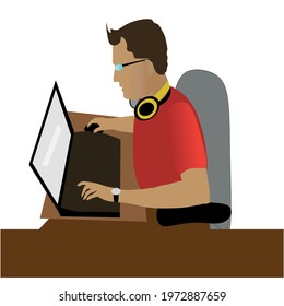 
IT specialist programmer at the computer with glasses