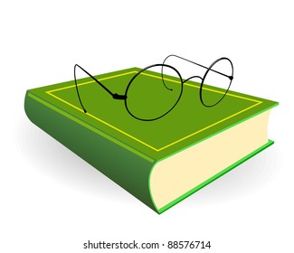 Spectacles and green book on a white background