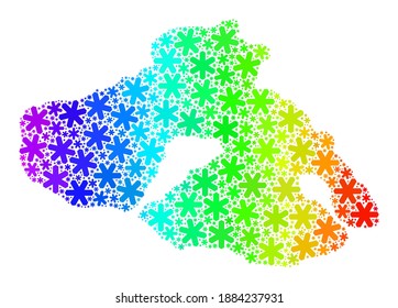 Composición de gradientes espectrales del mapa de la isla de Lesbos creado para anuncios navideños. El mosaico de mapas de la isla de Lesbos se ha creado con copos de nieve brillantes. Diseñado para anuncios de invierno.