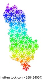 Spectral gradient mosaic of Albania map created for Winter ads. Albania map mosaic is created of vibrant snow items. Designed for New Year projects.
