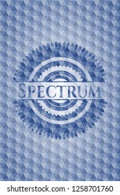 Spectrum blue emblem with geometric pattern.