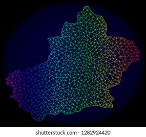 Spectrum colored mesh vector map of Xinjiang Uyghur Region isolated on a dark blue background. Abstract lines, triangles forms map of Xinjiang Uyghur Region. Carcass model for political posters.