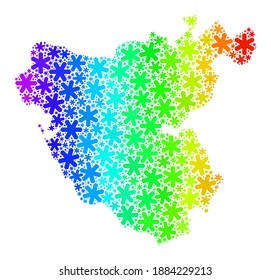 Collage de gradientes de espectro del mapa de la provincia de Cádiz combinado para vacaciones de invierno. El mosaico cartográfico de la provincia de Cádiz está diseñado con copos de nieve multicolores. Diseñado para aplicaciones de Año Nuevo.