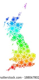 Spectrum gradient composition of Great Britain map designed for New Year sales. Great Britain map mosaic is formed with bright snow flakes. Designed for New Year applications.