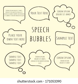 Speech bubble collection. Set of  hand-drawn speech and thought bubbles with sample text isolated on beige background. Vector illustration. 