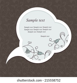 Speech bubble with floral elements on floral background.