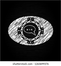 speech bubble icon drawn on a blackboard