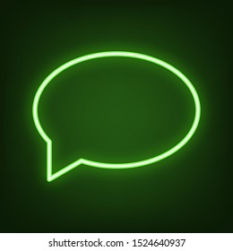 Speech bubble icon. Green neon icon in the dark. Blurred lightening. Illustration.