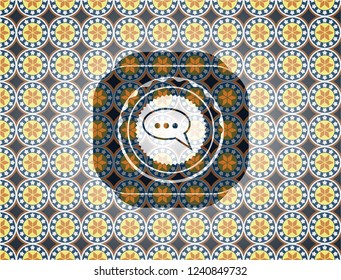 speech bubble icon inside arabic style badge. Arabesque decoration.