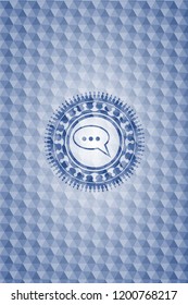 speech bubble icon inside blue hexagon emblem.