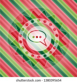 speech bubble icon inside christmas style emblem.