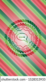 speech bubble icon inside christmas colors style emblem.