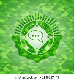 speech bubble icon inside green emblem with mosaic ecological style background
