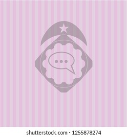 speech bubble icon inside realistic pink emblem