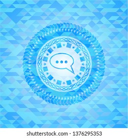speech bubble icon inside realistic light blue mosaic emblem