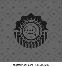 speech bubble icon inside realistic black emblem