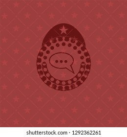speech bubble icon inside retro style red emblem