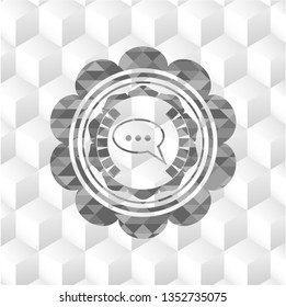 speech bubble icon inside retro style grey emblem with geometric cube white background