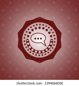 speech bubble icon inside retro red emblem