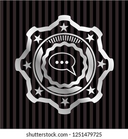 speech bubble icon inside silvery shiny badge